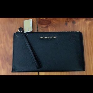 Micheal Kors wallet.